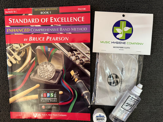 Baritone B.C. Standard of Excellence Book 1 with music accessories.