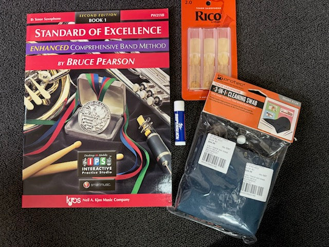 Tenor saxophone student bundle with book, reeds, grease, and cleaning swab.
